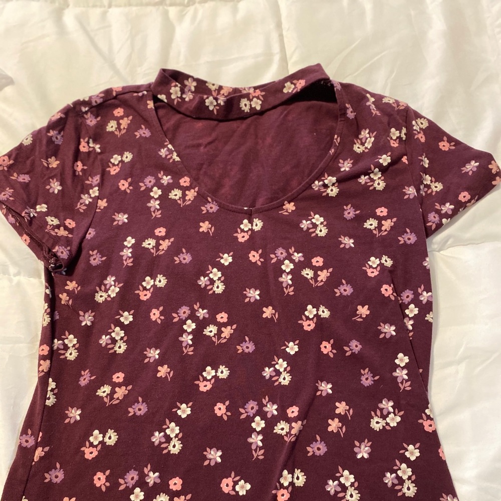 Purple floral short sleeve top.